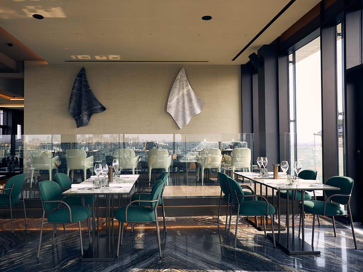 Restaurant with a view of the Milan skyline
